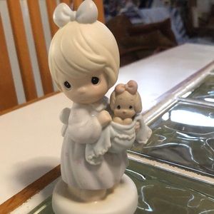 VintagePrecious moments -pastel colors.  Taking care of your precious baby